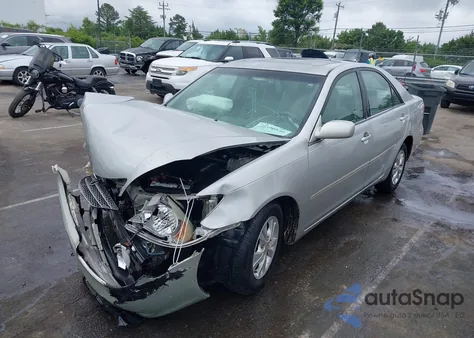 2004 Toyota Camry Le V6 z USA, uszkodzony, nr VIN 4T1BF32K24U070150